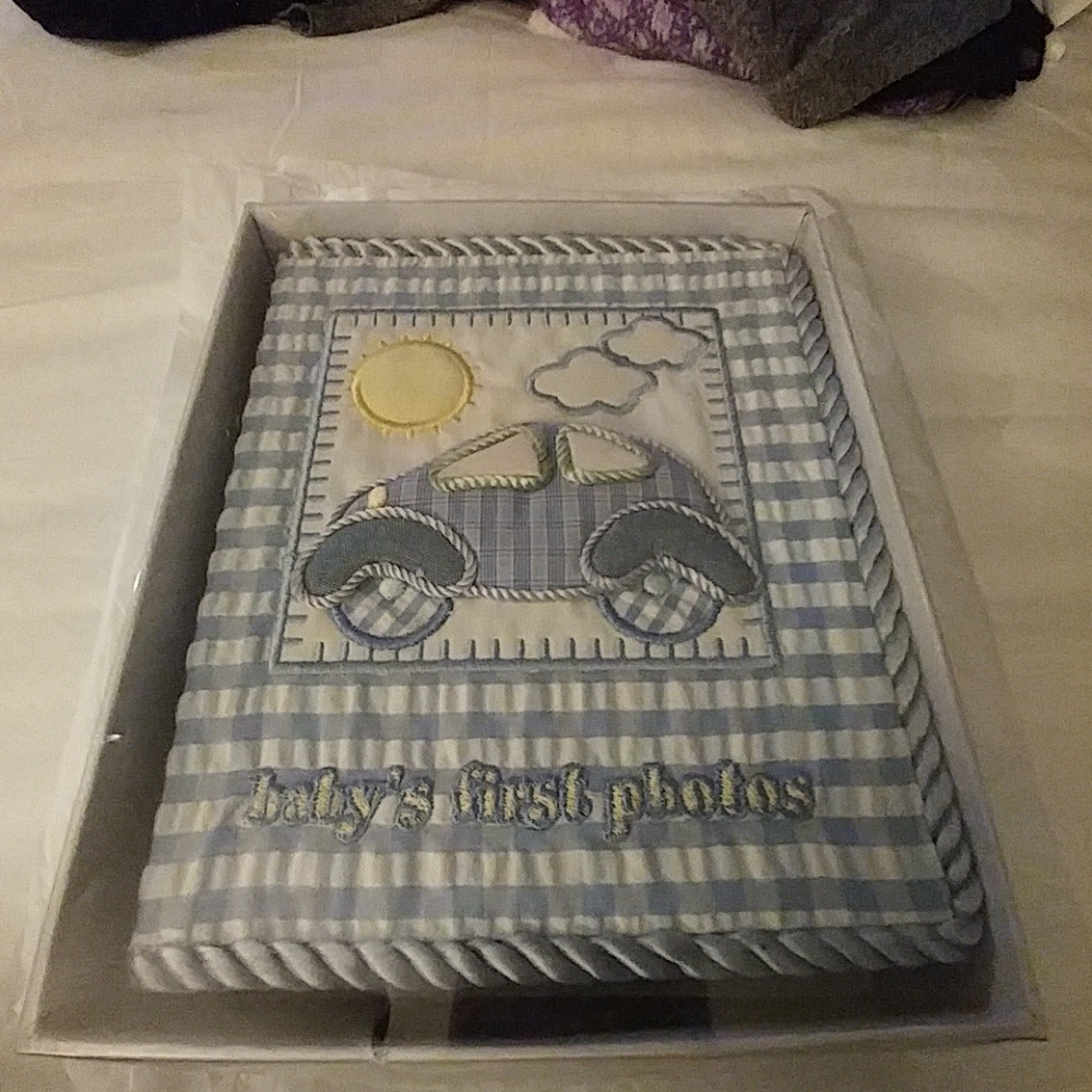 BABY'S FIRST PHOTO ALBUM